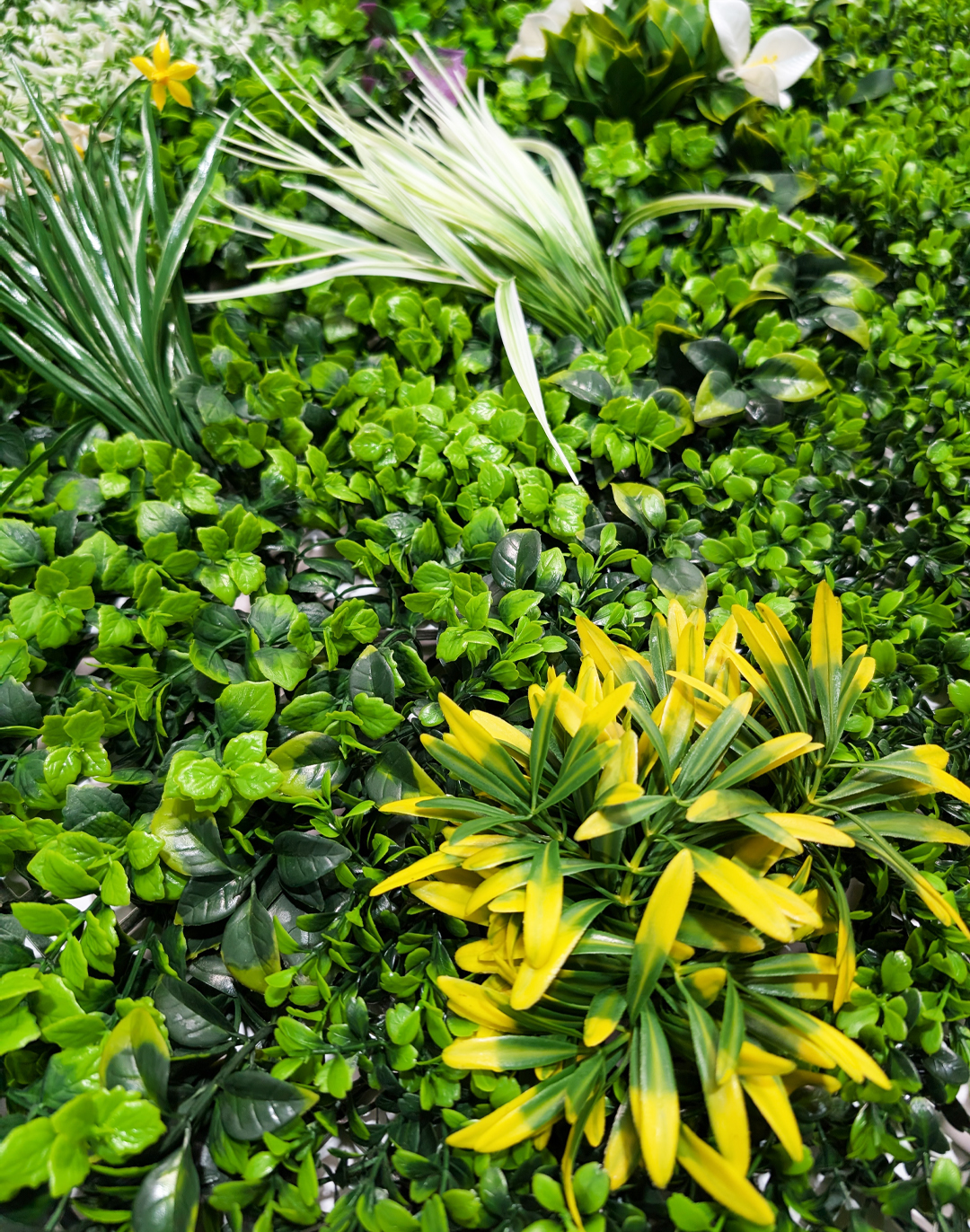 Pflanzenwand - Botanic Fusion (252) - 100x100 cm AKUSTIL Botanic Fusion 3 Pflanzenwand mit grünen gelben Kunstpflanzen PVC Wandpaneel für Büro Gastronomie